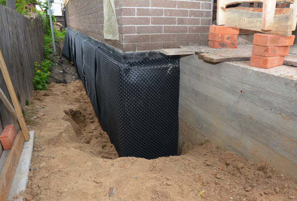 Happy homeowners after waterproofing job in Silver Springs